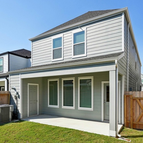 A perfect fit for the whole family patio with storage closet and backyard with fencing