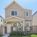 Exterior view of The Villas at Tamarron home with covered front porch and front yard